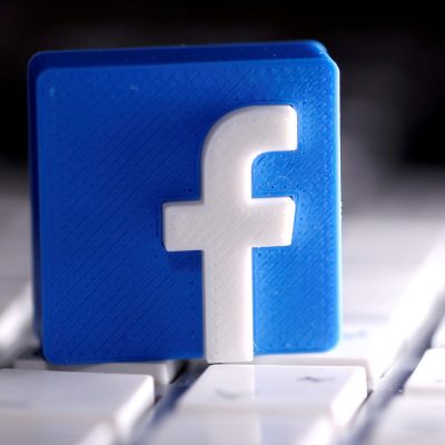 FILE PHOTO: A 3D-printed Facebook logo is seen placed on a keyboard in this illustration taken March 25, 2020. REUTERS/Dado Ruvic/Illustration